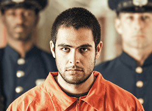Image of man in police custody